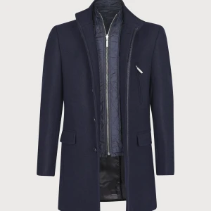 Marinblå ullrock - En helt ny ullrock från Dressmann. Nyskick då den nästan aldrig har användts. Nypris: 2499 kr.