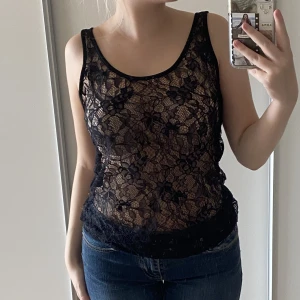 spetslinne  - svart spetslinne