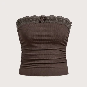 Brun tub topp strl S - Säljer denna tub topp i strl S. Passar även XS. Aldrig använd. 