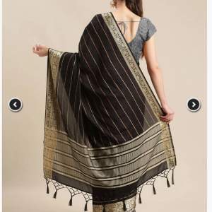 Black silk saree with blouse and satin skirt to wear underneath saree. Woven silk fabric 
