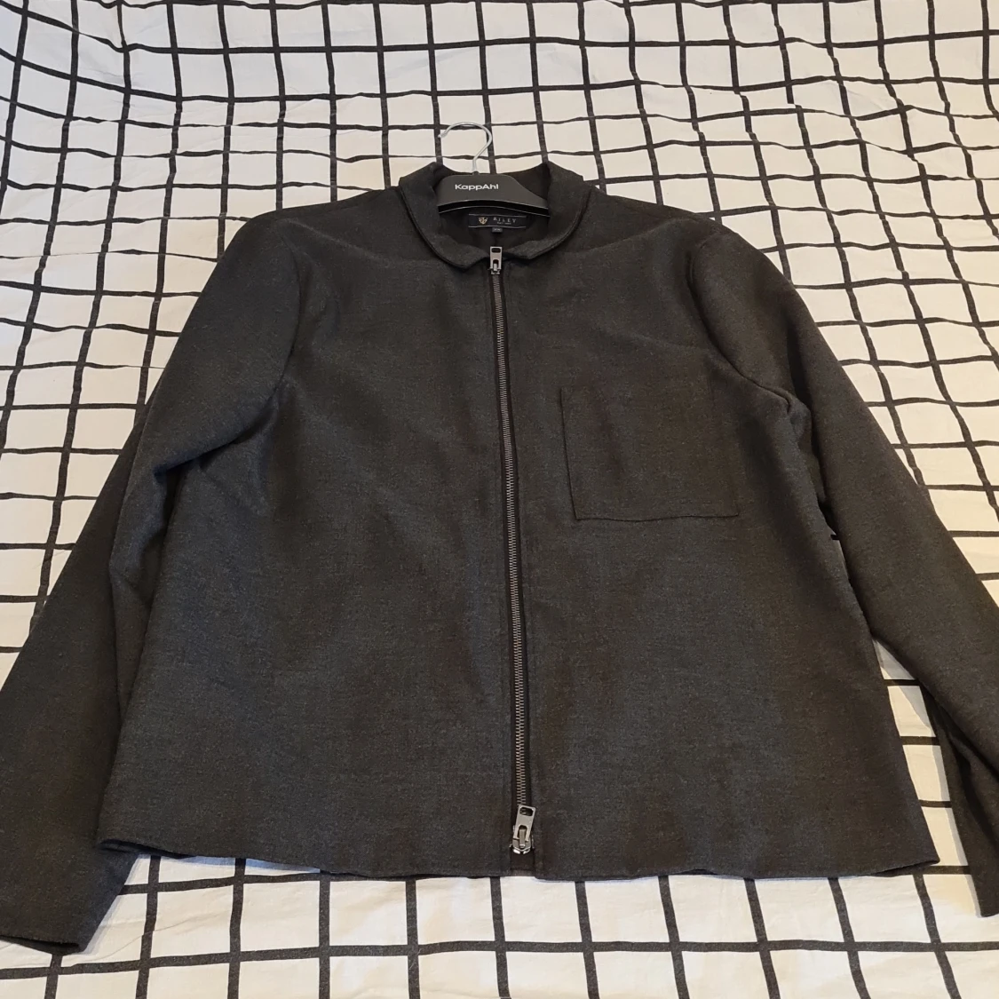 Svartgrå jacka 
