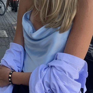 Festtopp - Ljusblå festtopp, kan skicka fler bilder vid intresse 