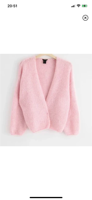 Stickad kofta - Stickad kofta från Lindex, köpt på plick men jag har endast testat den. I bra skick! Slutsåld 