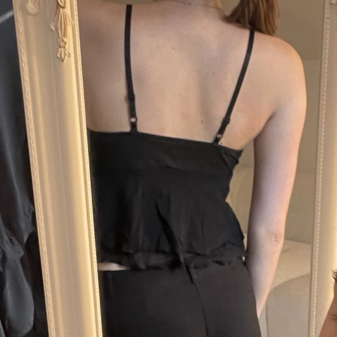 Svart topp med rosett - 90