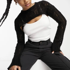 Stickad bolero - Bolero från COLLUSION. Strl 38, passar 36. 