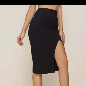 kjol med slita - svart kjol med slits