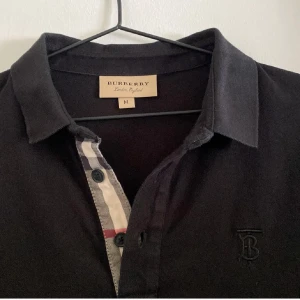 Burberry Piké - Säljer en fin burberry piké. Säljs pga inte använder längre.