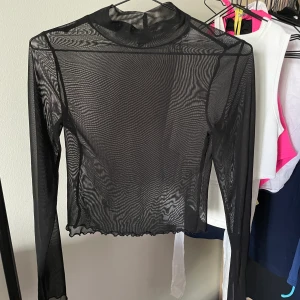 Genomskinlig topp - Sparsamt använd