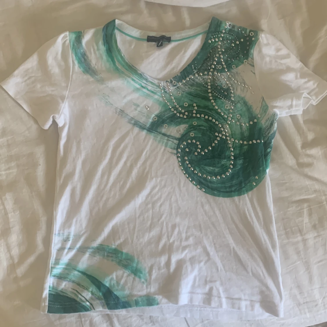 grön detaljerad tröja