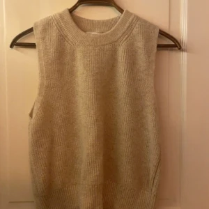 Beige väst  - Fin väst, oanvänd, normal i storlek, stl.S 