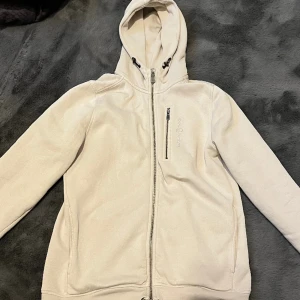 Sail racing hoodie - Sail racing hoodie i färgen beige, storlek 170, användts några gånger. 