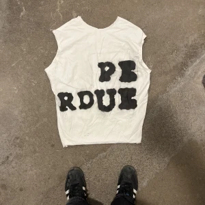 Perdue Tröja - Perdue tröja utan ärmar. 