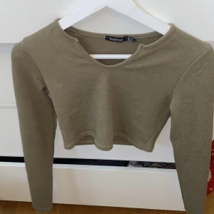 Topp - Långärmad beige topp Från boohoo  Storlek xs