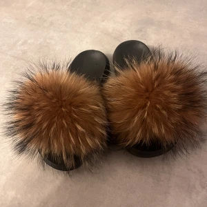 Pälstofflor  - Från garoff storlek 38 äkta päls oanvända 