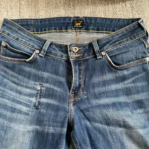 Lee jeans  - Vintage lee jeans med snygg bootcut low waist fit!! Size 30/31 