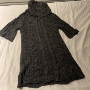 Loose turtle neck knitwear - Mango