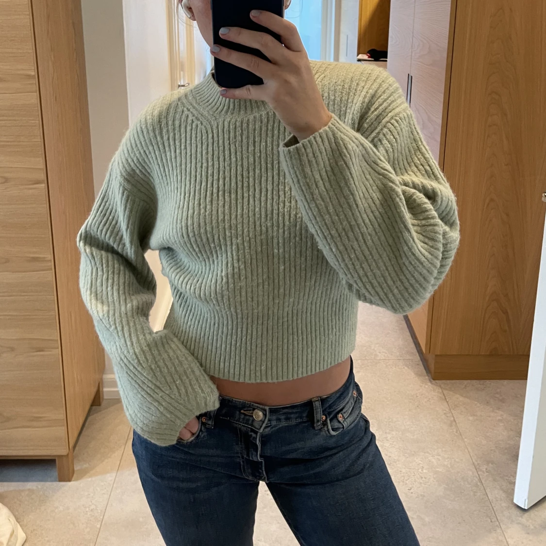 Stickad ljusgrön tröja