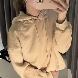 Beige hoodie i bra skick