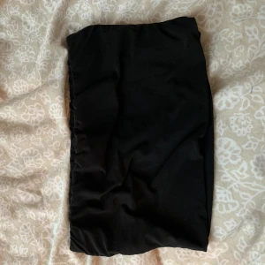 Tube topp - Svart tubetopp, aldrig använd, stretchig