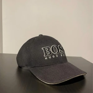 Hugo boss keps  - Hugo boss keps  använd nåra gånger men är som ny
