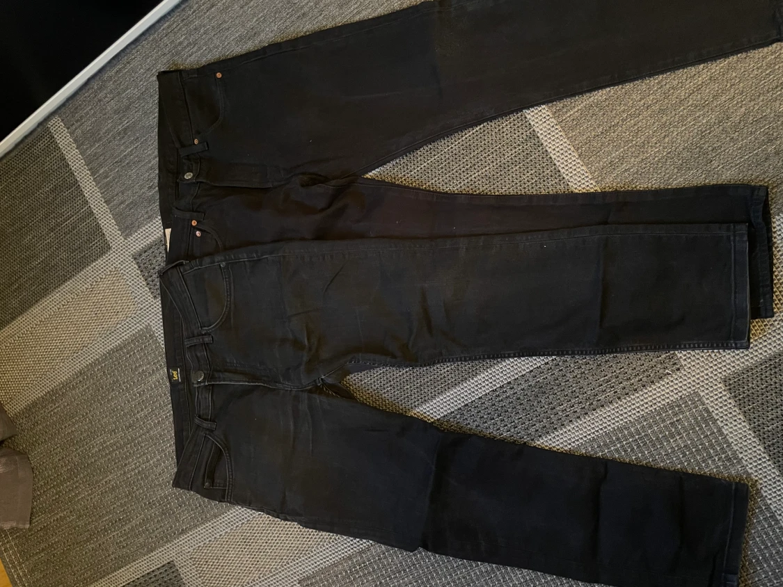 Svarta jeans Levis,Lee