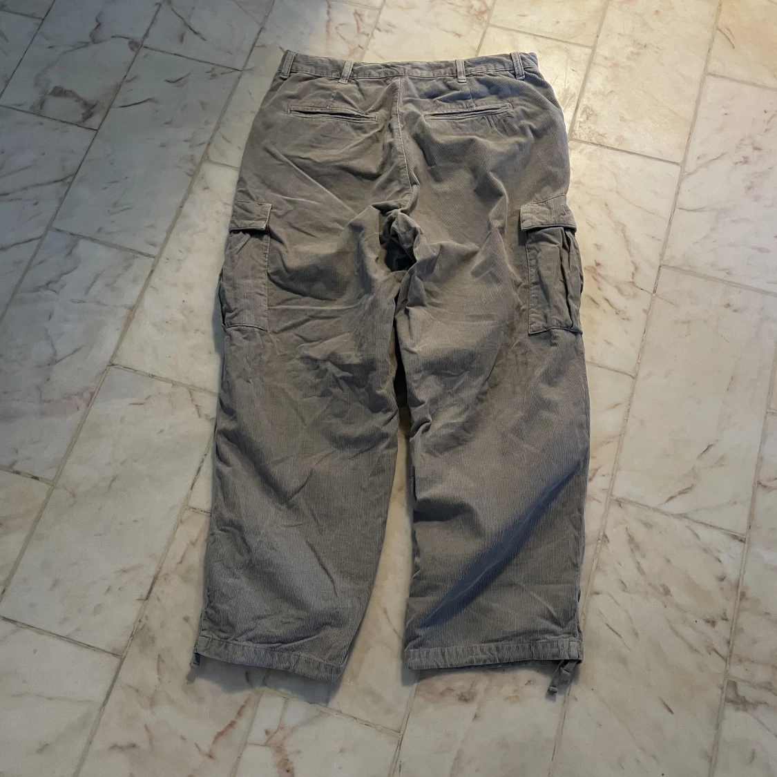 Gråa Manchester byxor  - 90