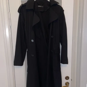 Trenchcoat i tunt tyg - I bra skick