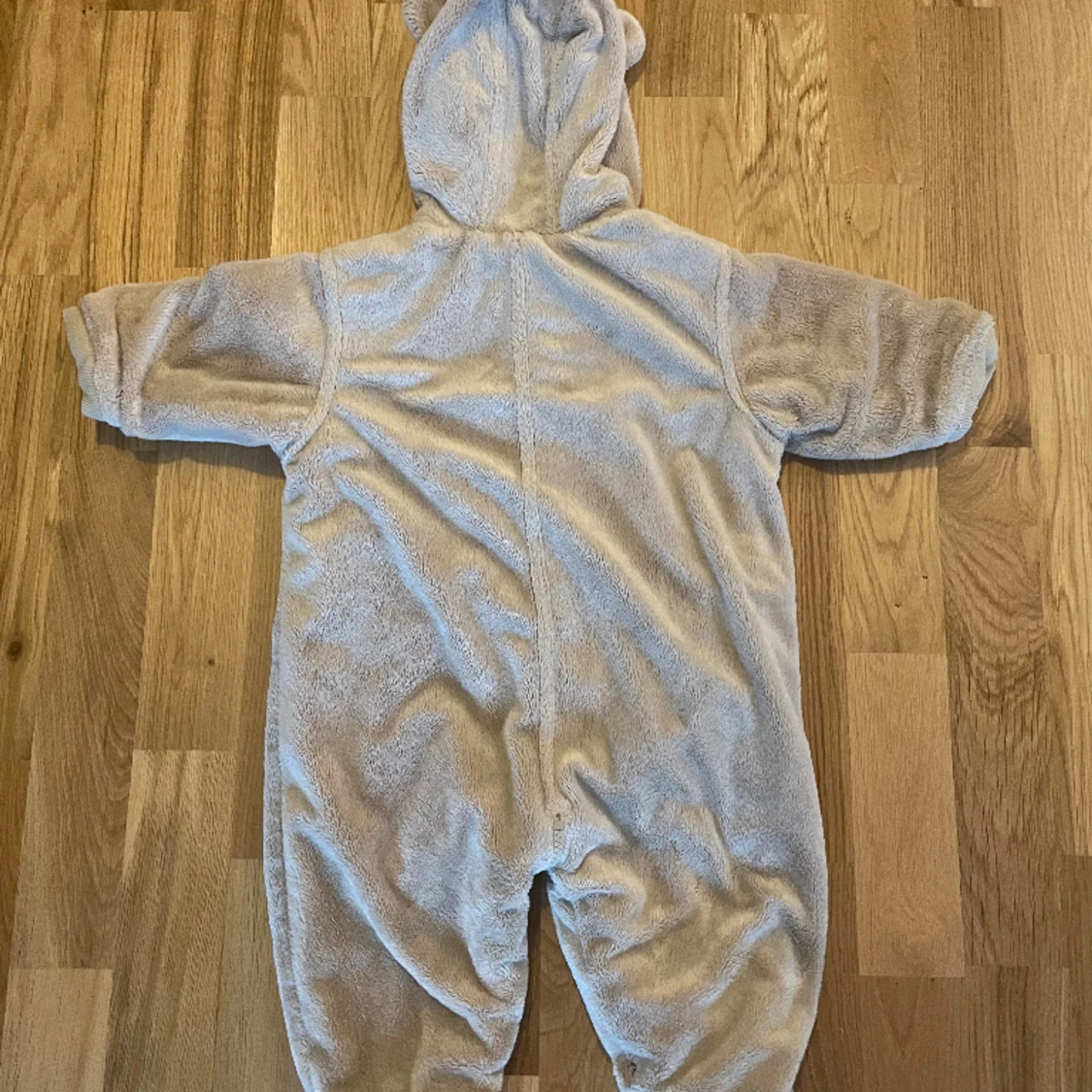 Teddy overall med öron i storlek 71 - 90