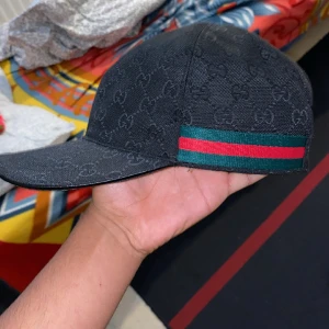 Gucci Baseball keps, Canva Black - Köpt i sommras, så den är ganska ny, kan även tänka mig byten.