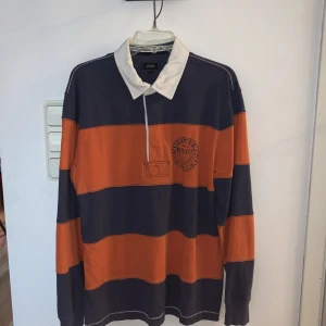 Långärmad piké Boomerang  - Långärmad piké från boomerang. Skön sommarpiké, storlek L 