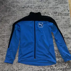 Blå och svart puma jumper zip up