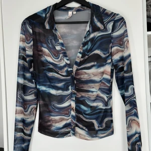 Meshtopp - Snygg topp i mesh från Nelly i storlek S, endast använd en gång! 