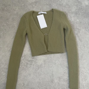 Top  - Helt ny med prislapp 