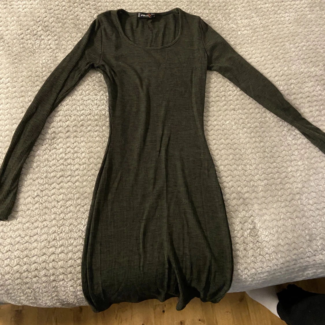 Långärmad klänning