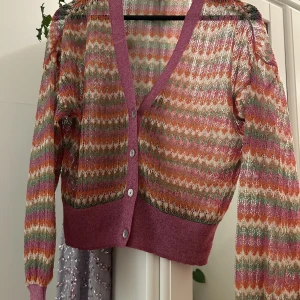 Glittrig kofta  - Använd några få gånger. Ganska liten i storlek.