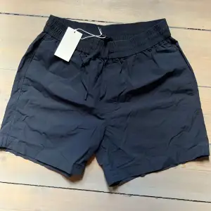 Never worn shorts from COS, size S. 