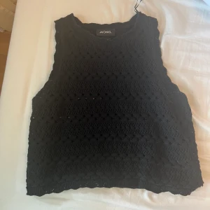 Crochet vest - Black crochet sweater vest from monki! Only worn once, excellent condition! Super cute for summer. Size large