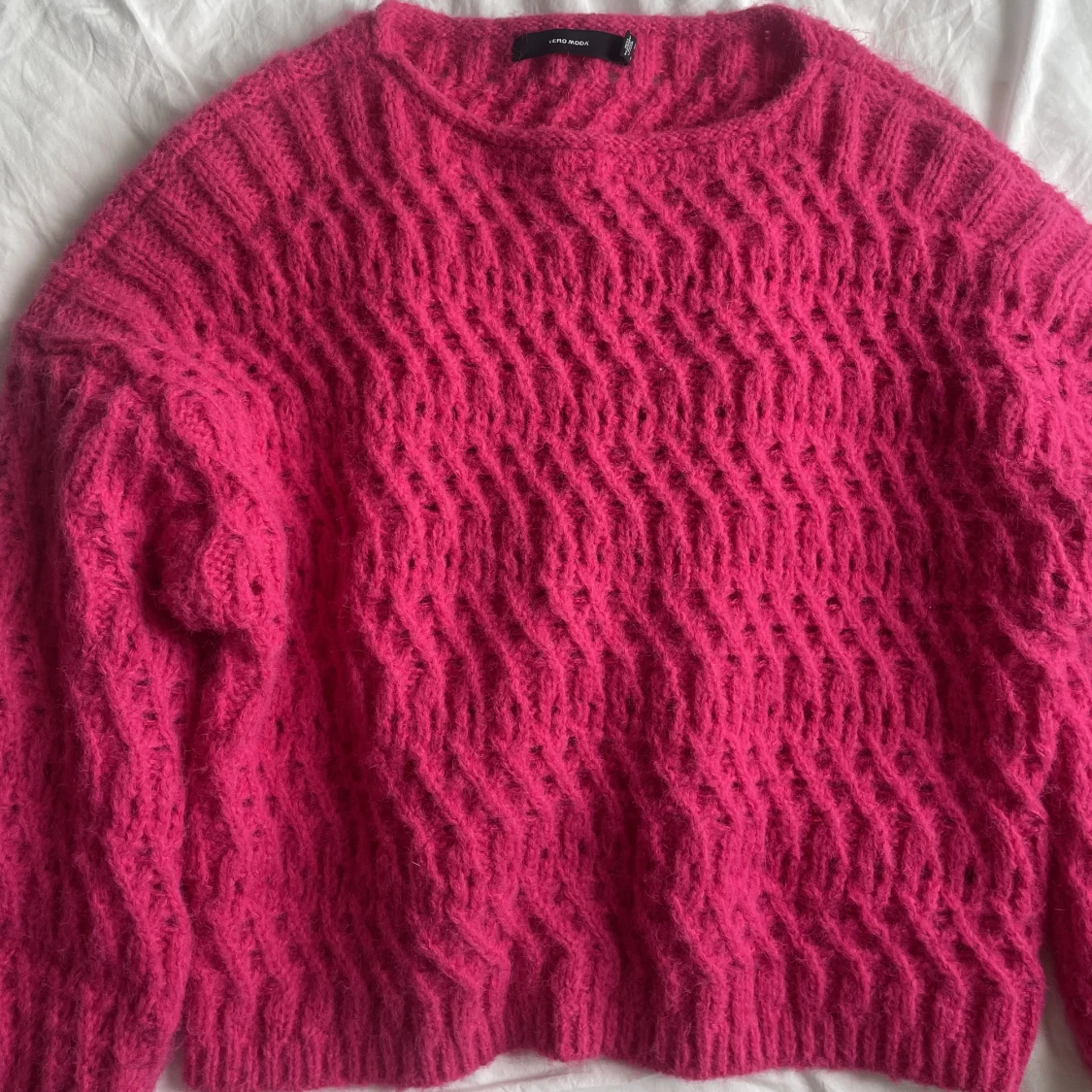 Overzised stickad rosa tröja 