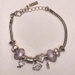 Pandora likande armband, roseguld med rosa detaljer 