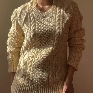 Vintage Chunky Braided Wool Sweater. Best Fits M/L. Styled On Model As Oversized Fit.    68 cm (26.8 in) Length, 71 cm (28 in) Sleeve,  41 cm (16.1 in) Shoulders,  86 cm (33.9 in) Chest,  84 cm (33.1 in) Waist 