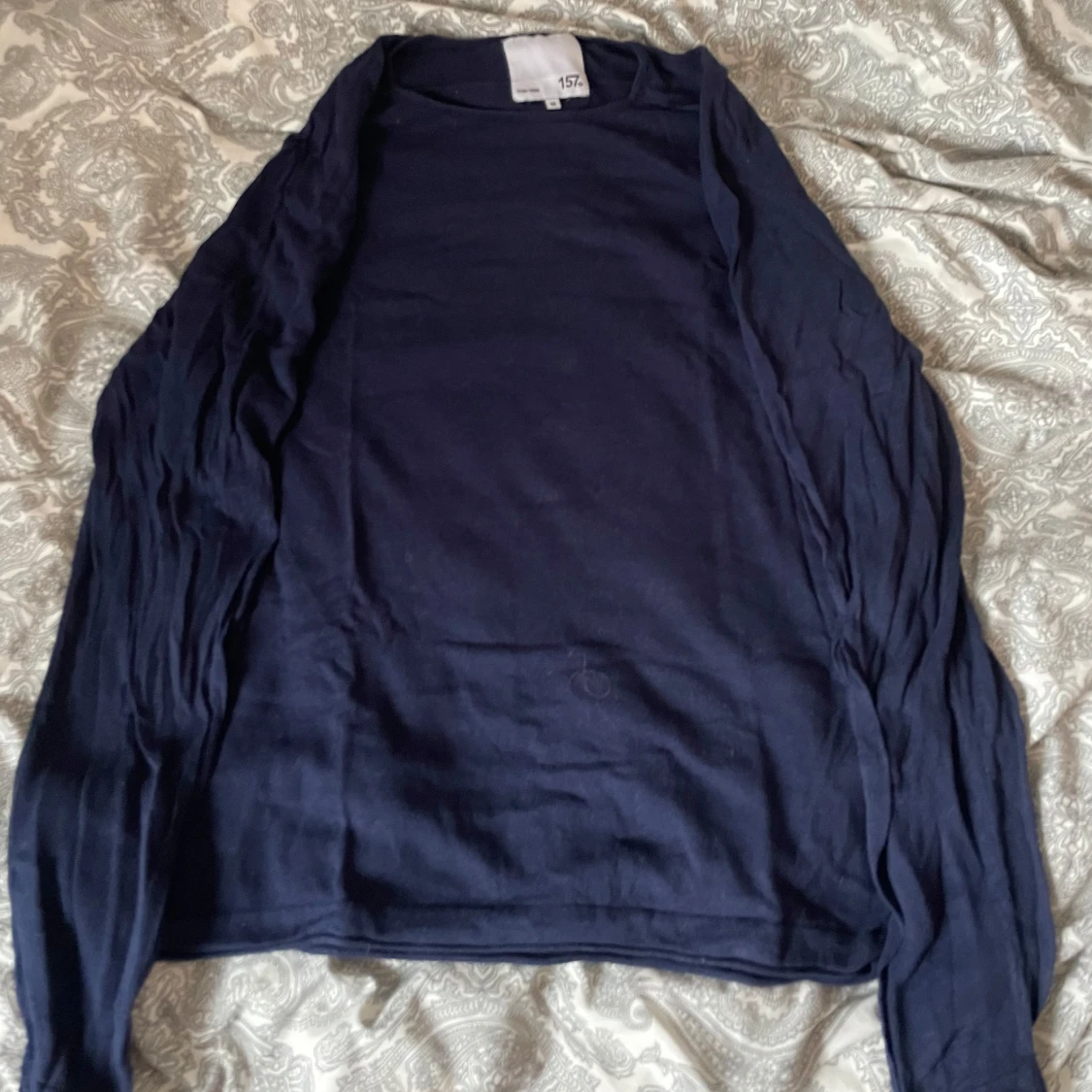Mörkblå långärmad tröja