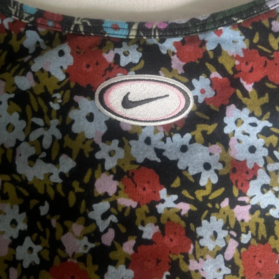 Blommig kortklänning från Nike XS - 3