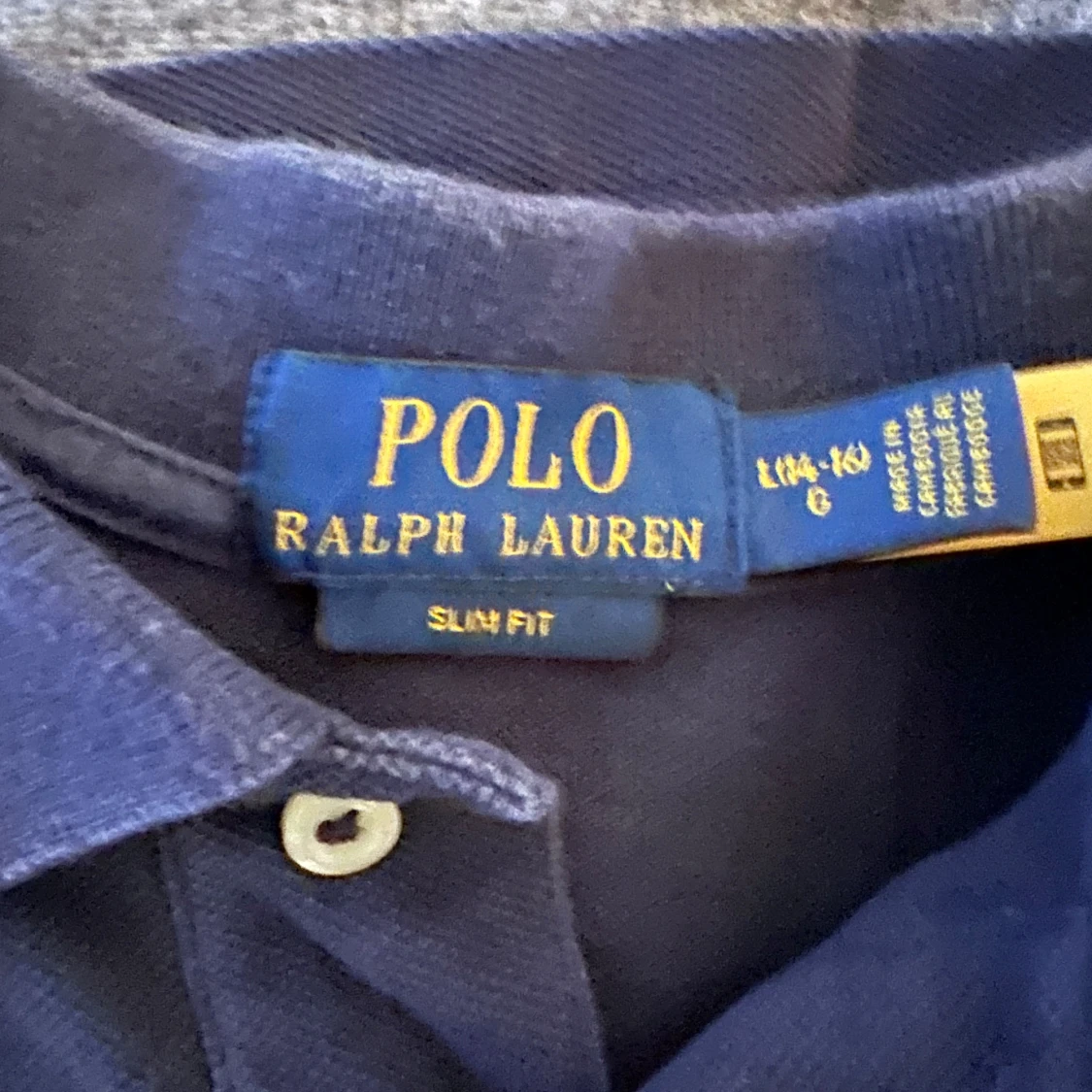 Mörkblå pikétröja från Ralph Lauren - 1