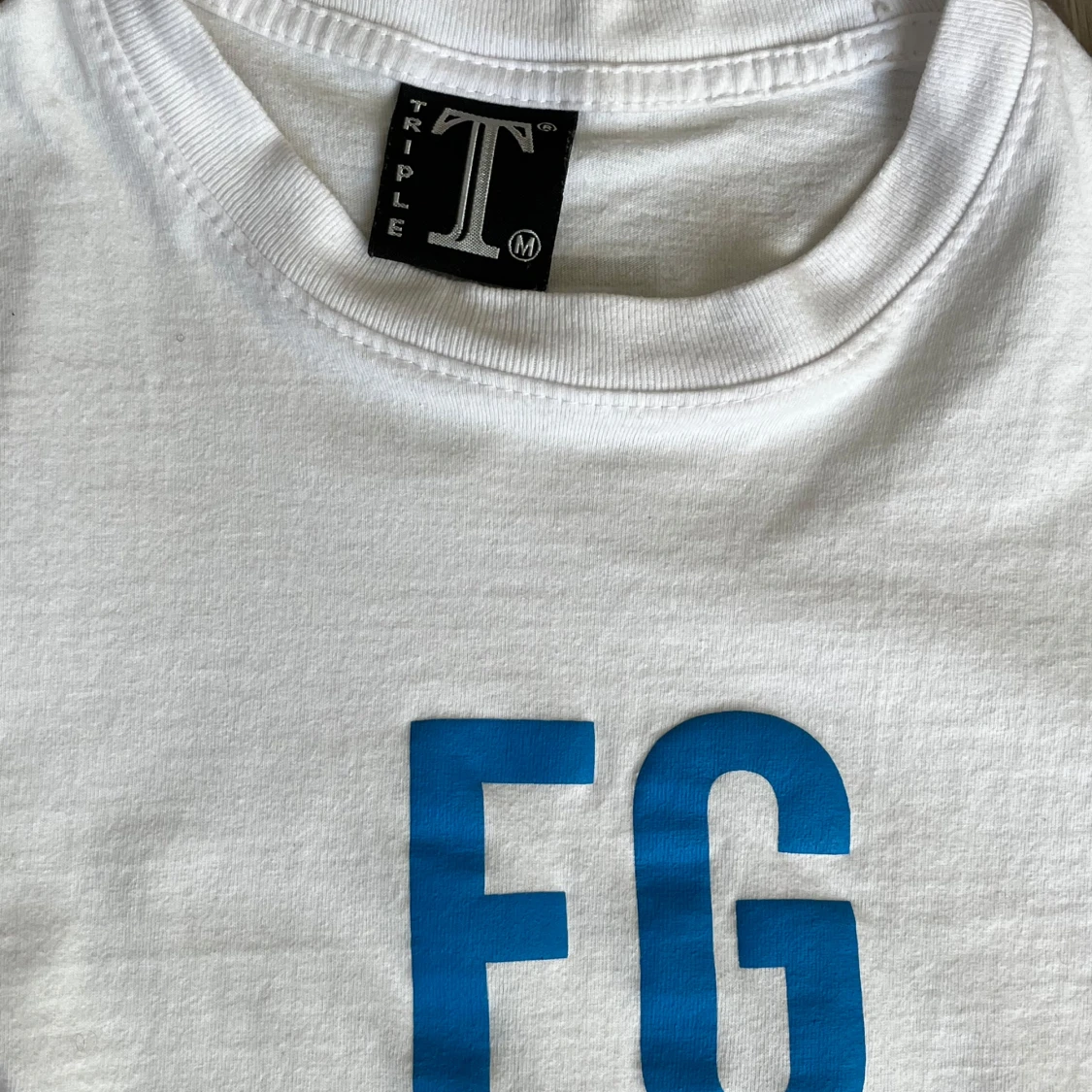Vit t-shirt FG från Triple T - 3