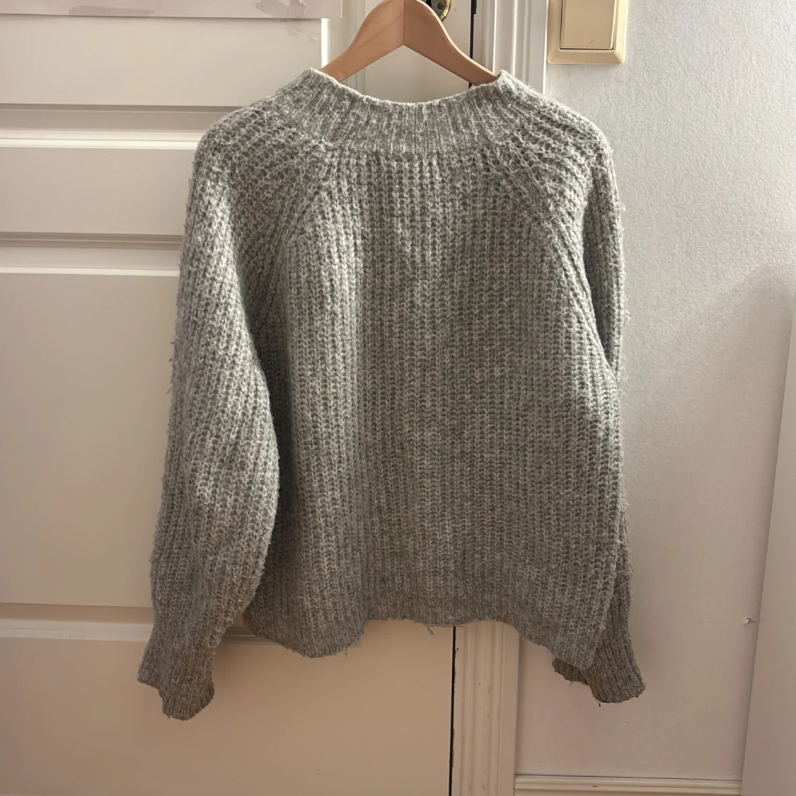 Grå stickad tröja från 157 - 1