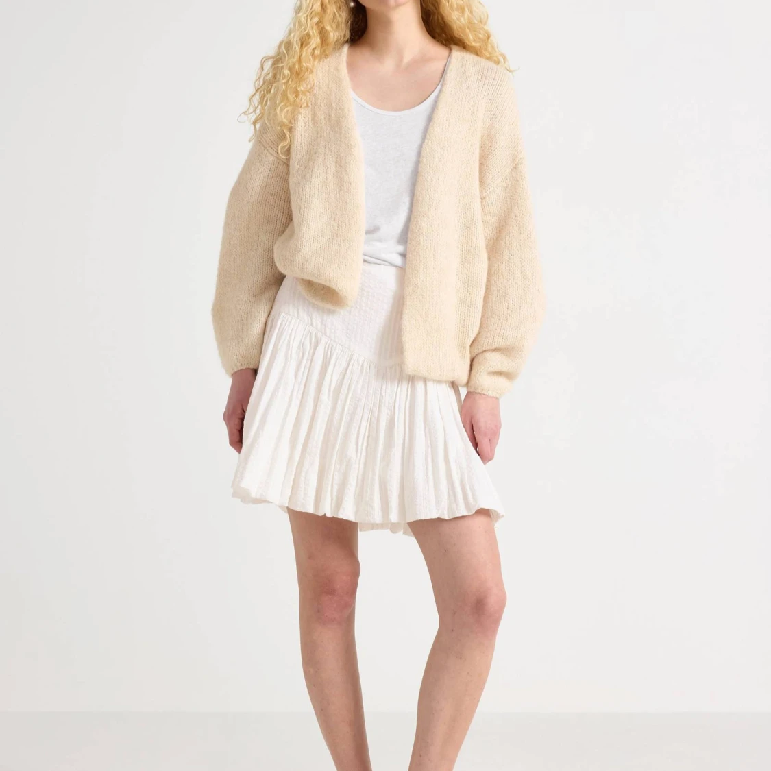 Beige stickad kofta med loose fit