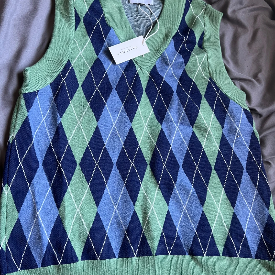 Grön och blå rutig väst från Vailent
