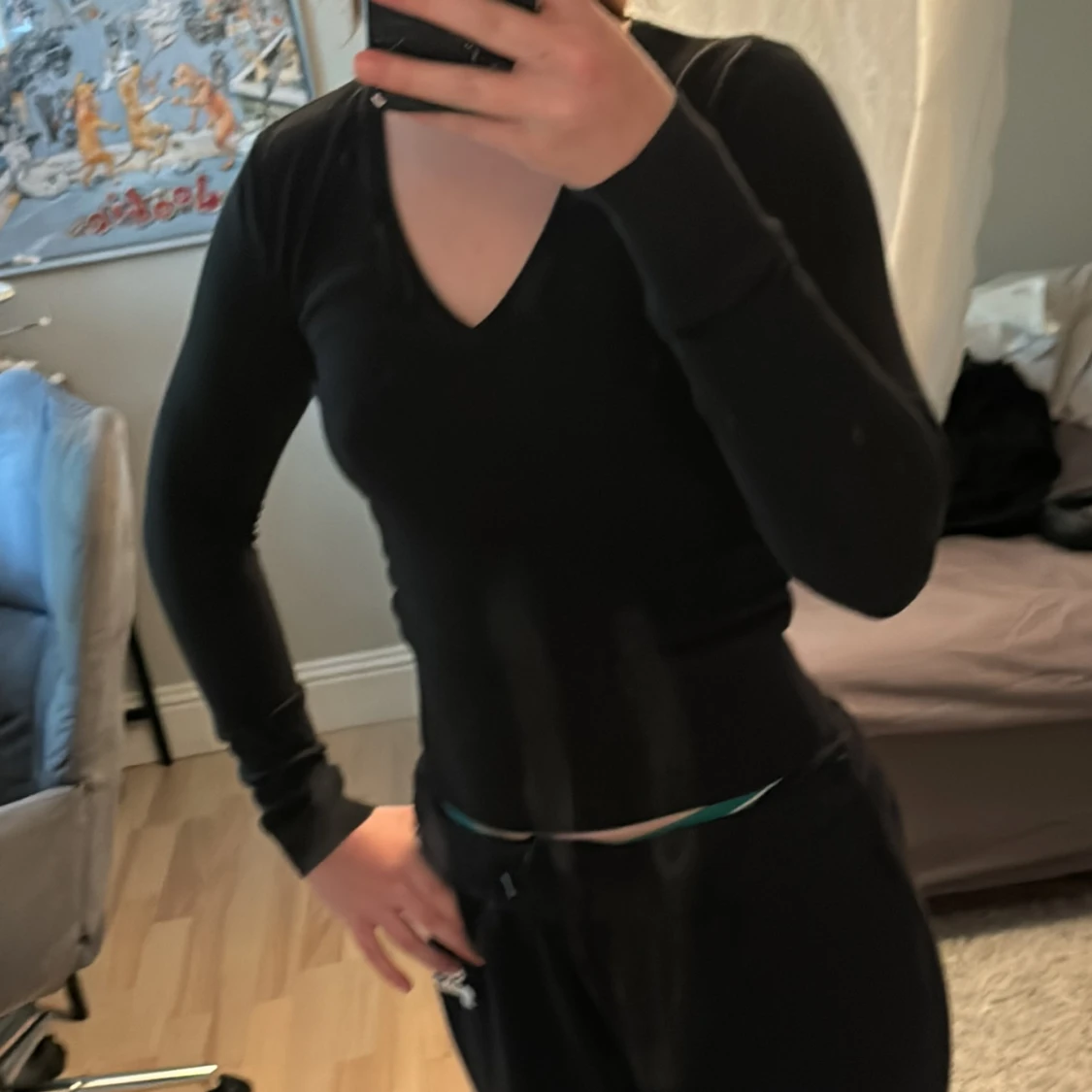 Svart v-ringad tröja i storlek 38 - 1