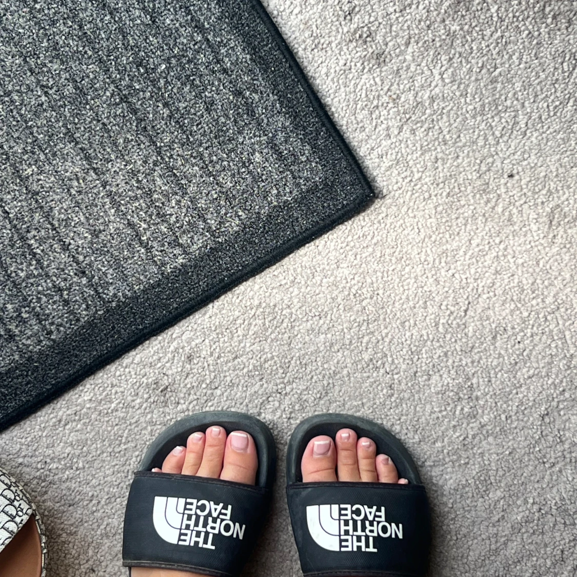 Tofflor från  The North Face - 2