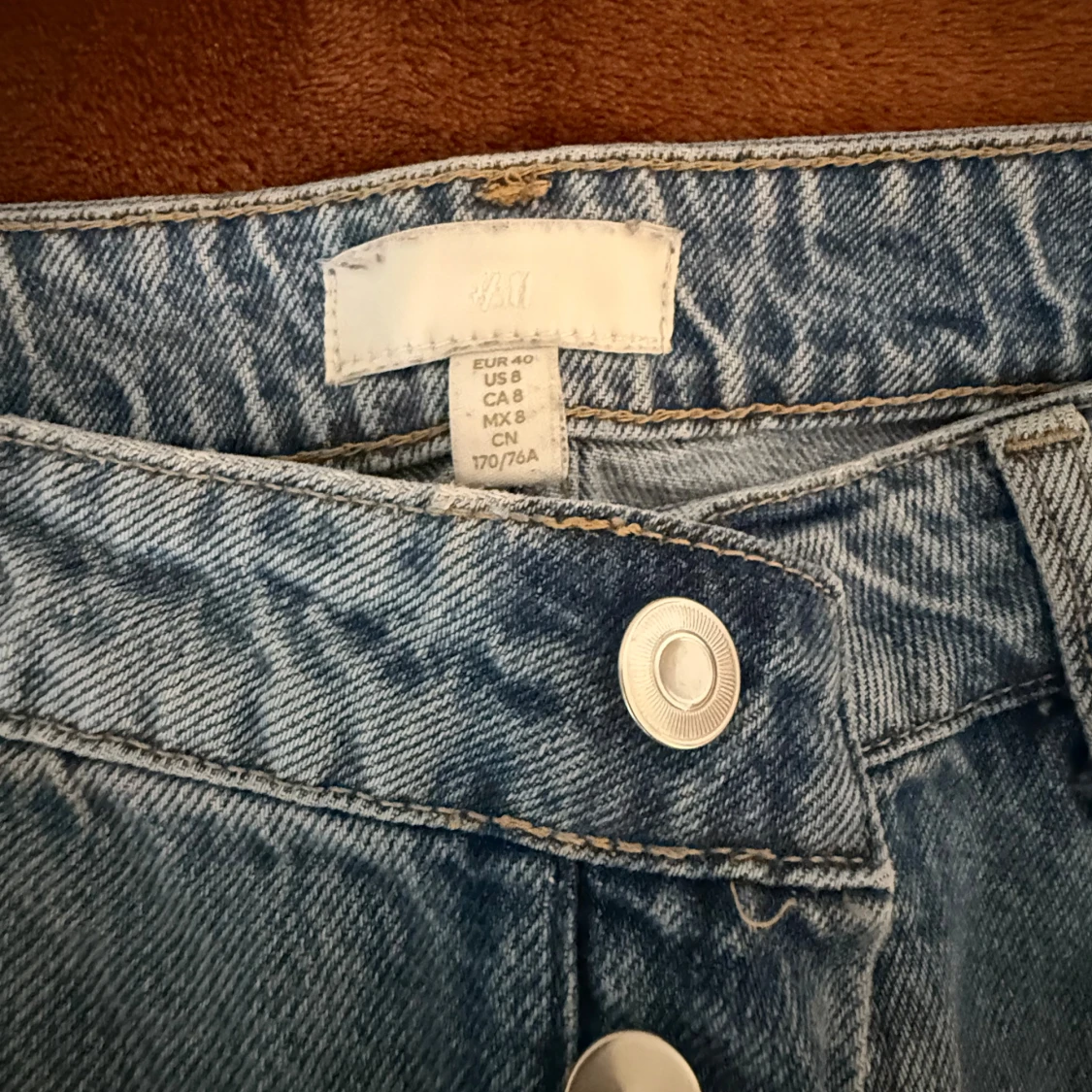 Blå raka jeans från H&M - 1